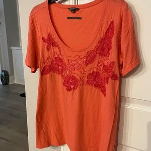 Salmon colored hand embroidered flowered t-shirt